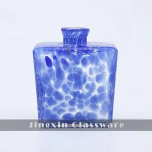 Rektangulärt blått ljus med glas som täcker för aromaterapi